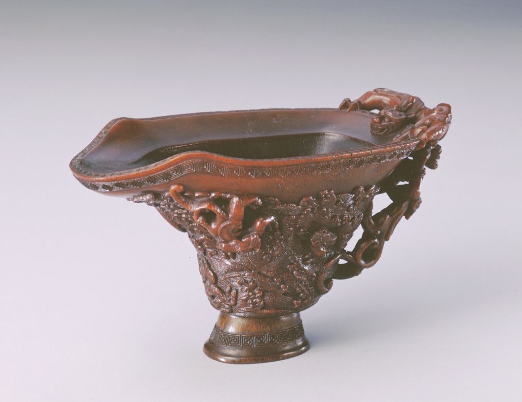 图片[1]-Rhinoceros horn carved three-dragon handle sea water dragon tiger cup-China Archive